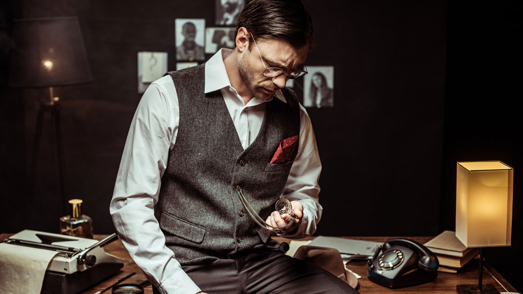 Mann in Weste mit Taschenuhr